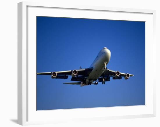 Commercial Airplane in Flight-Mitch Diamond-Framed Photographic Print