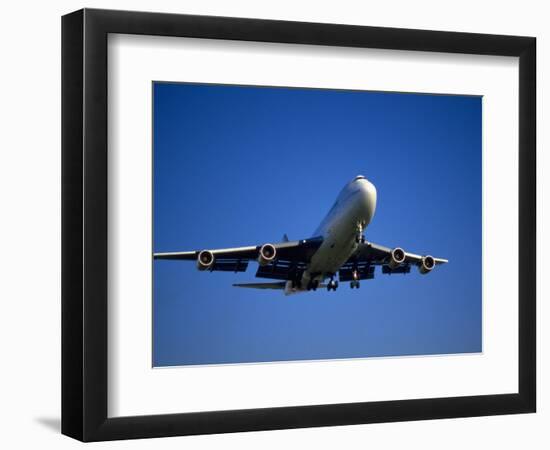 Commercial Airplane in Flight-Mitch Diamond-Framed Photographic Print