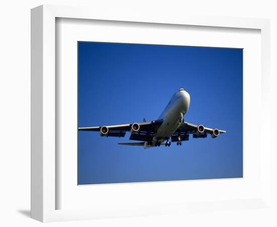 Commercial Airplane in Flight-Mitch Diamond-Framed Photographic Print