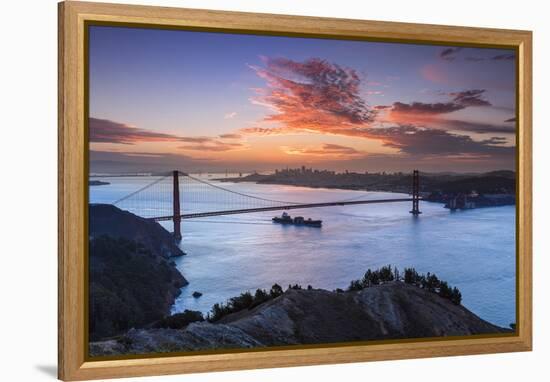 Commercial Ship Leaves San Francisco Bay Beneath The Golden Gate Bridge At Sunrise-Joe Azure-Framed Premier Image Canvas