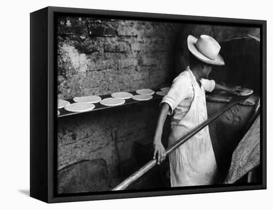 Communal Bakery in Primitive Mexican Village, Loaves of Bread Being Shoved into Adobe Oven-null-Framed Premier Image Canvas