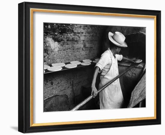 Communal Bakery in Primitive Mexican Village, Loaves of Bread Being Shoved into Adobe Oven-null-Framed Photographic Print