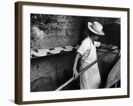 Communal Bakery in Primitive Mexican Village, Loaves of Bread Being Shoved into Adobe Oven-null-Framed Photographic Print