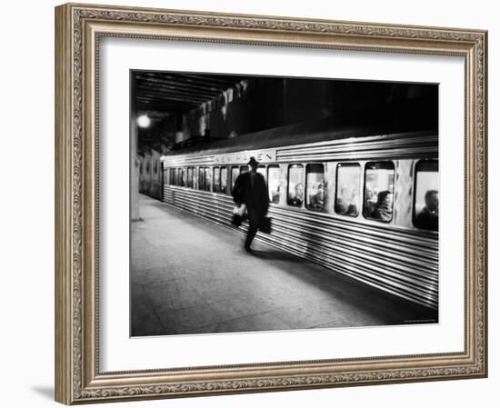 Commuter on the New York New Haven Line Running to Catch Train Pulling Out of Grand Central Station-Alfred Eisenstaedt-Framed Photographic Print