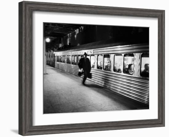 Commuter on the New York New Haven Line Running to Catch Train Pulling Out of Grand Central Station-Alfred Eisenstaedt-Framed Photographic Print