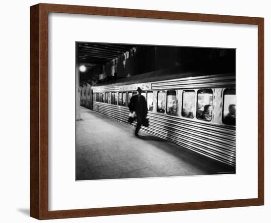 Commuter on the New York New Haven Line Running to Catch Train Pulling Out of Grand Central Station-Alfred Eisenstaedt-Framed Photographic Print