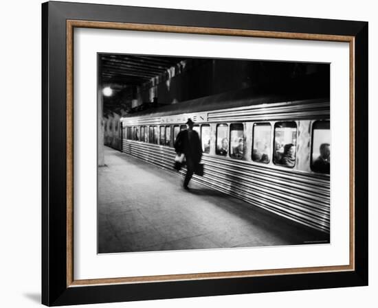 Commuter on the New York New Haven Line Running to Catch Train Pulling Out of Grand Central Station-Alfred Eisenstaedt-Framed Photographic Print