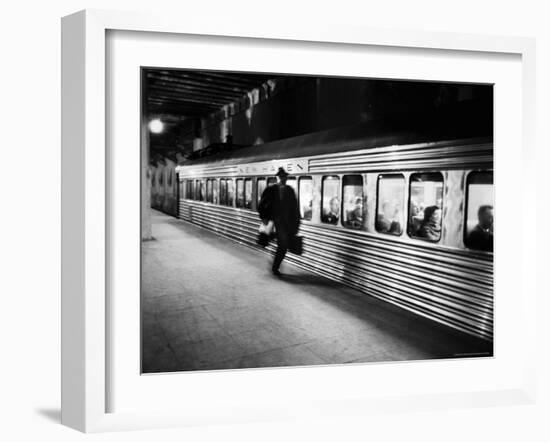 Commuter on the New York New Haven Line Running to Catch Train Pulling Out of Grand Central Station-Alfred Eisenstaedt-Framed Photographic Print