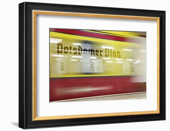 Commuter Train Speeding through Potsdamer Platz U-Bahn Station-Jon Hicks-Framed Photographic Print