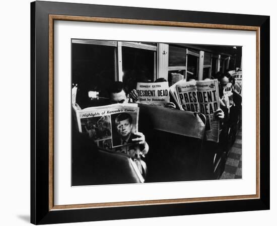 Commuters Reading of John F. Kennedy's Assassination-Carl Mydans-Framed Photographic Print