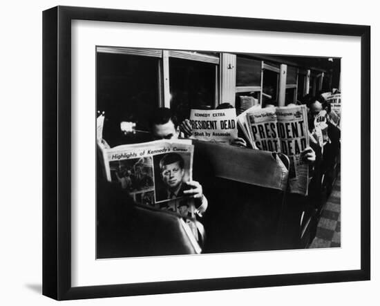 Commuters Reading of John F. Kennedy's Assassination-Carl Mydans-Framed Photographic Print