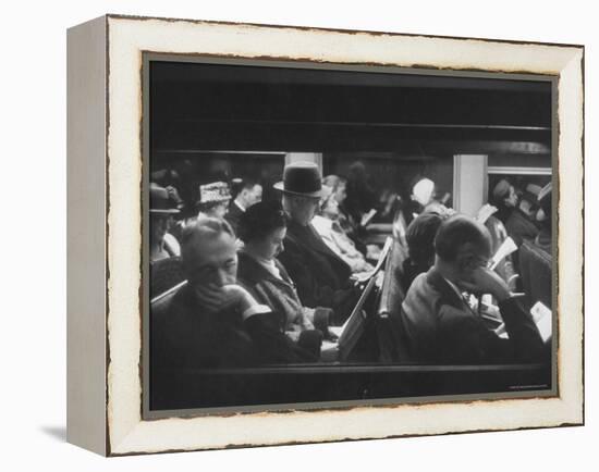 Commuters Reading on the Train-Walter Sanders-Framed Premier Image Canvas