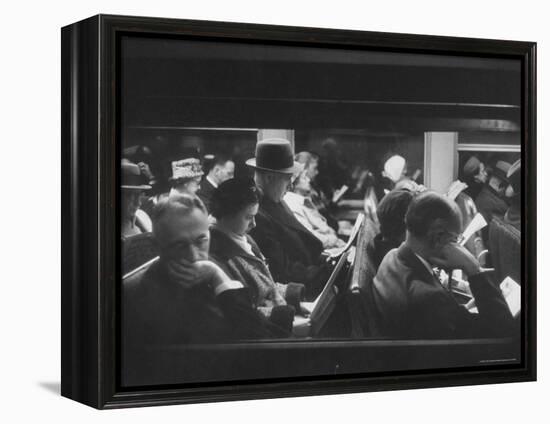 Commuters Reading on the Train-Walter Sanders-Framed Premier Image Canvas