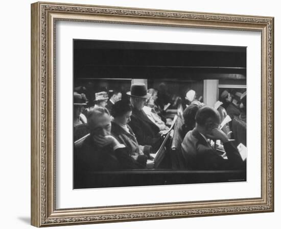 Commuters Reading on the Train-Walter Sanders-Framed Photographic Print