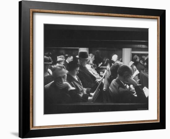 Commuters Reading on the Train-Walter Sanders-Framed Photographic Print