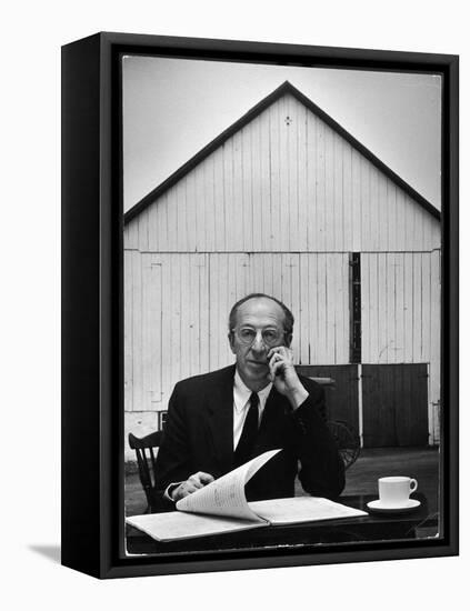 Composer Arron Copland Sitting at Table with Score in Front of Barn-Gordon Parks-Framed Premier Image Canvas
