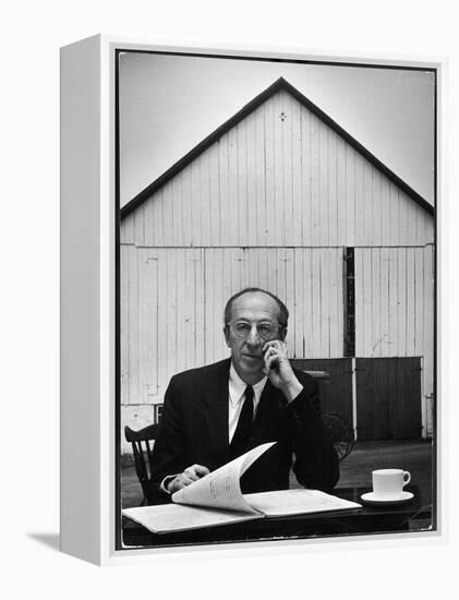 Composer Arron Copland Sitting at Table with Score in Front of Barn-Gordon Parks-Framed Premier Image Canvas