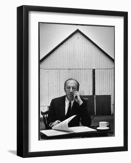 Composer Arron Copland Sitting at Table with Score in Front of Barn-Gordon Parks-Framed Photographic Print