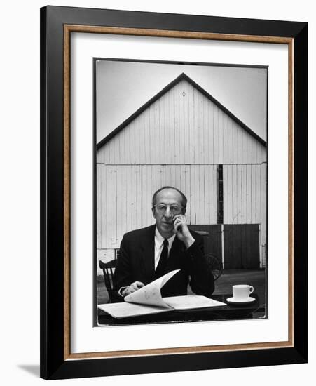 Composer Arron Copland Sitting at Table with Score in Front of Barn-Gordon Parks-Framed Photographic Print