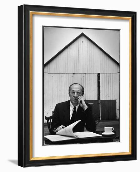 Composer Arron Copland Sitting at Table with Score in Front of Barn-Gordon Parks-Framed Photographic Print