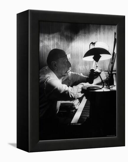 Composer Igor Stravinsky Working at a Piano in an Empty Dance Hall in Venice-Gjon Mili-Framed Premier Image Canvas