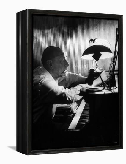 Composer Igor Stravinsky Working at a Piano in an Empty Dance Hall in Venice-Gjon Mili-Framed Premier Image Canvas