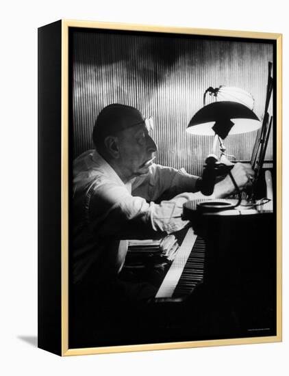 Composer Igor Stravinsky Working at a Piano in an Empty Dance Hall in Venice-Gjon Mili-Framed Premier Image Canvas