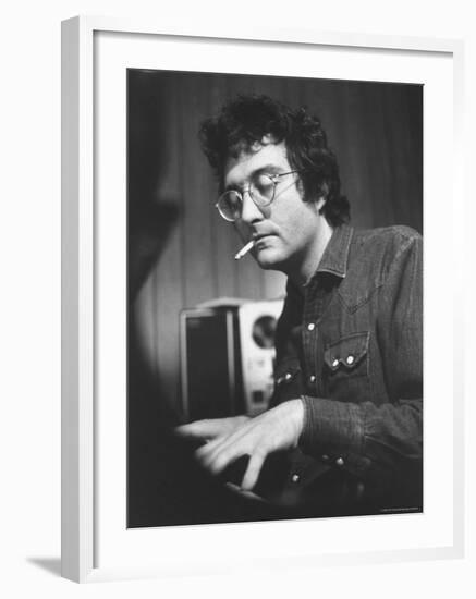 Composer Randy Newman Working at Piano, Smoking Cigarette-Bill Eppridge-Framed Premium Photographic Print