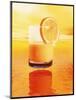 Computer Art of Glass of Orange Juice & Orange Sea-Victor Habbick-Mounted Photographic Print