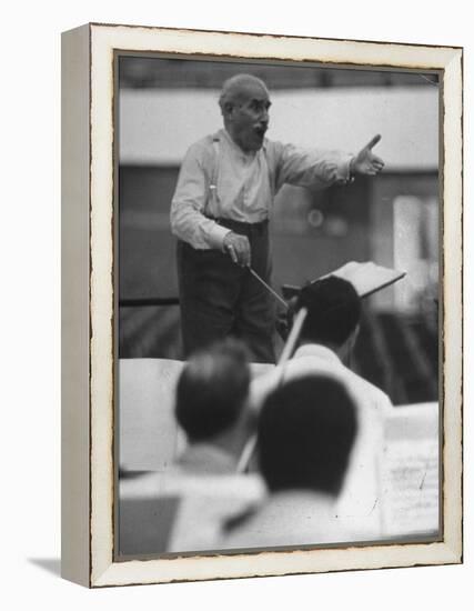 Conductor Arturo Toscanini, Singing and Shouting Instructions While Rehearsing His Men in a Gym-Joe Scherschel-Framed Premier Image Canvas