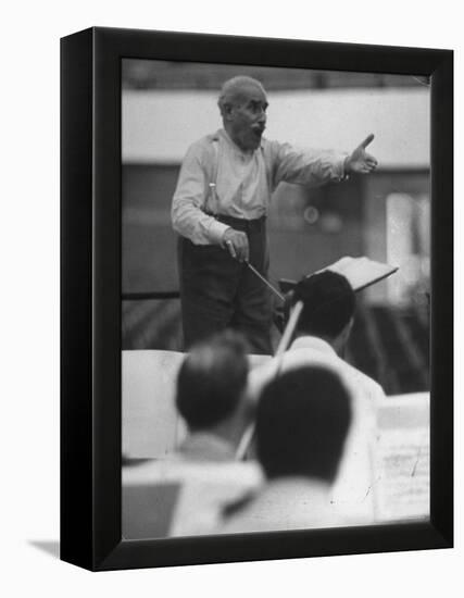 Conductor Arturo Toscanini, Singing and Shouting Instructions While Rehearsing His Men in a Gym-Joe Scherschel-Framed Premier Image Canvas