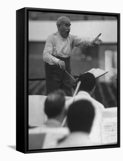 Conductor Arturo Toscanini, Singing and Shouting Instructions While Rehearsing His Men in a Gym-Joe Scherschel-Framed Premier Image Canvas