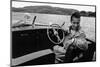 Conductor Herbert von Karajan, always a speed-buff, races a speed-boat across Lake Lucerne-Erich Lessing-Mounted Photographic Print