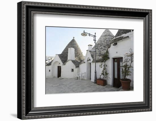 Cone-Shaped Trulli Houses, in the Rione Monte District of Alberobello, in Apulia, Italy-Stuart Forster-Framed Photographic Print