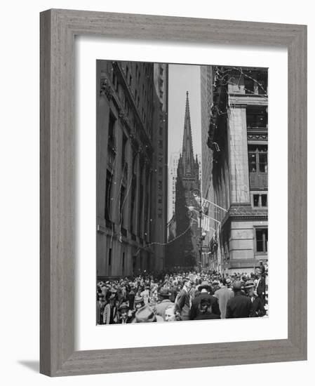 Confetti and Streamers Fly Down from Office Buildings, People Celebrating End of the War in Europe-Andreas Feininger-Framed Photographic Print