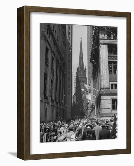 Confetti and Streamers Fly Down from Office Buildings, People Celebrating End of the War in Europe-Andreas Feininger-Framed Photographic Print