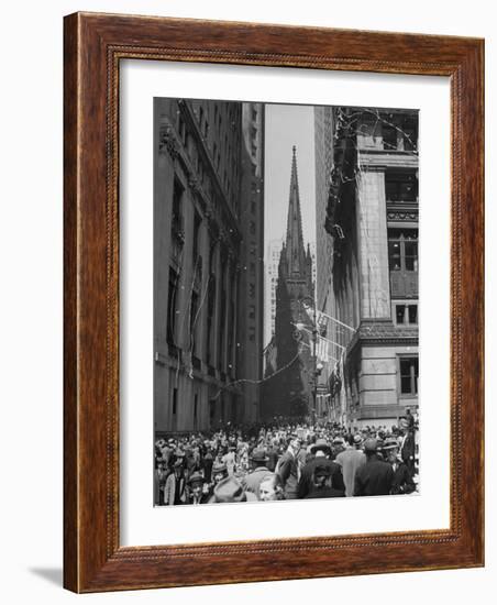 Confetti and Streamers Fly Down from Office Buildings, People Celebrating End of the War in Europe-Andreas Feininger-Framed Photographic Print