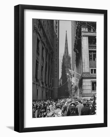 Confetti and Streamers Fly Down from Office Buildings, People Celebrating End of the War in Europe-Andreas Feininger-Framed Photographic Print