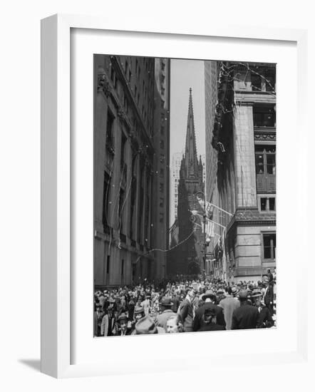 Confetti and Streamers Fly Down from Office Buildings, People Celebrating End of the War in Europe-Andreas Feininger-Framed Photographic Print