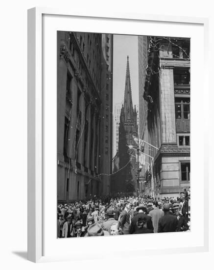 Confetti and Streamers Fly Down from Office Buildings, People Celebrating End of the War in Europe-Andreas Feininger-Framed Photographic Print