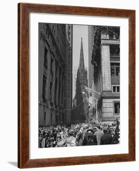 Confetti and Streamers Fly Down from Office Buildings, People Celebrating End of the War in Europe-Andreas Feininger-Framed Photographic Print