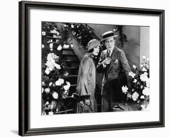 Confused Couple with Luggage-null-Framed Photo