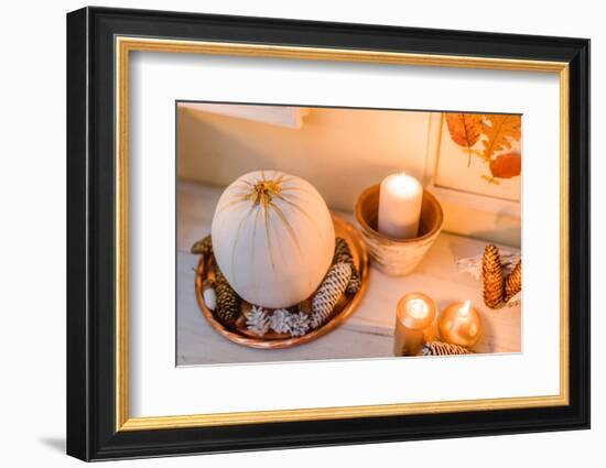 Console table, detail, autumnal decoration, candles, picture frames, leaves, pumpkin,-mauritius images-Framed Photographic Print