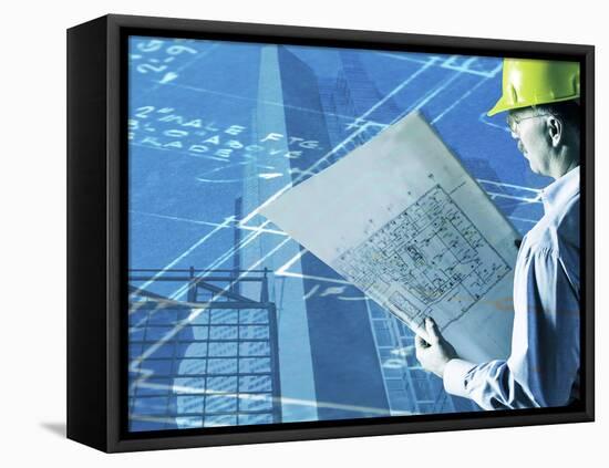 Construction Worker Reviewing a Drafting Plan-null-Framed Premier Image Canvas