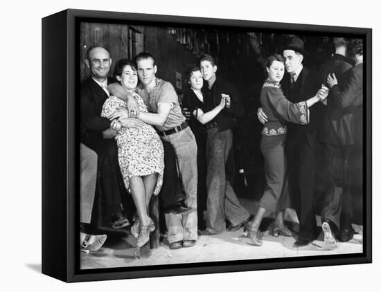 Construction Workers and Taxi Dancers Enjoying a Night Out in Barroom in Frontier Town-Margaret Bourke-White-Framed Premier Image Canvas