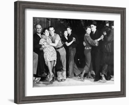Construction Workers and Taxi Dancers Enjoying a Night Out in Barroom in Frontier Town-Margaret Bourke-White-Framed Photographic Print