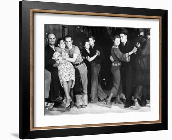 Construction Workers and Taxi Dancers Enjoying a Night Out in Barroom in Frontier Town-Margaret Bourke-White-Framed Photographic Print