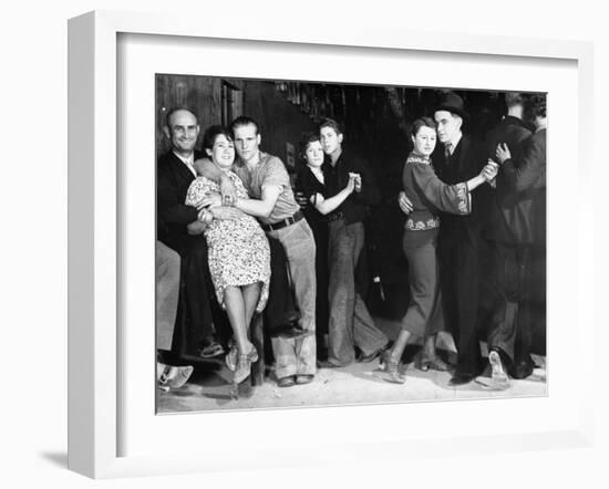 Construction Workers and Taxi Dancers Enjoying a Night Out in Barroom in Frontier Town-Margaret Bourke-White-Framed Photographic Print