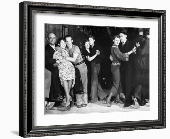 Construction Workers and Taxi Dancers Enjoying a Night Out in Barroom in Frontier Town-Margaret Bourke-White-Framed Photographic Print