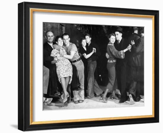 Construction Workers and Taxi Dancers Enjoying a Night Out in Barroom in Frontier Town-Margaret Bourke-White-Framed Photographic Print